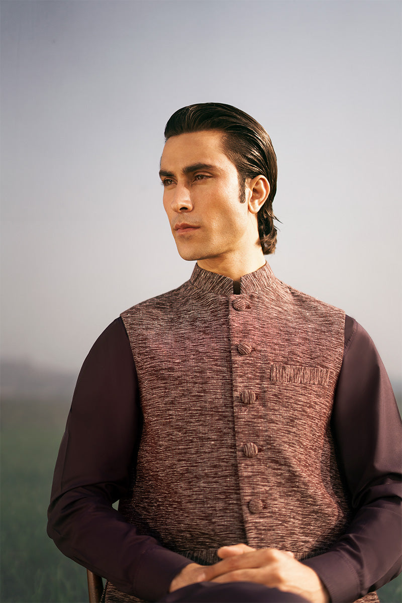 Elegant maroon designer waistcoat for men, perfect for formal and semi-formal events in Pakistan. Stylish waistcoat design for men.