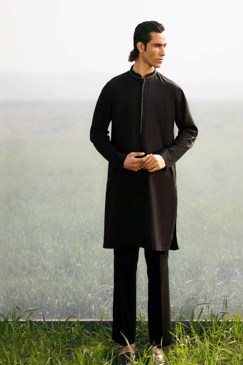 Classic designer kurta pajama paired with a plum waistcoat, featuring a unique kurta design for men