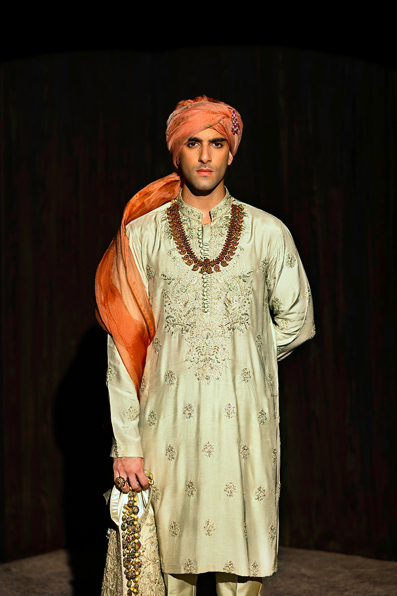 Designer pastel green kurta with waistcoat available online in Pakistan, featuring intricate embroidery and premium fabric, perfect for festive and formal occasions.