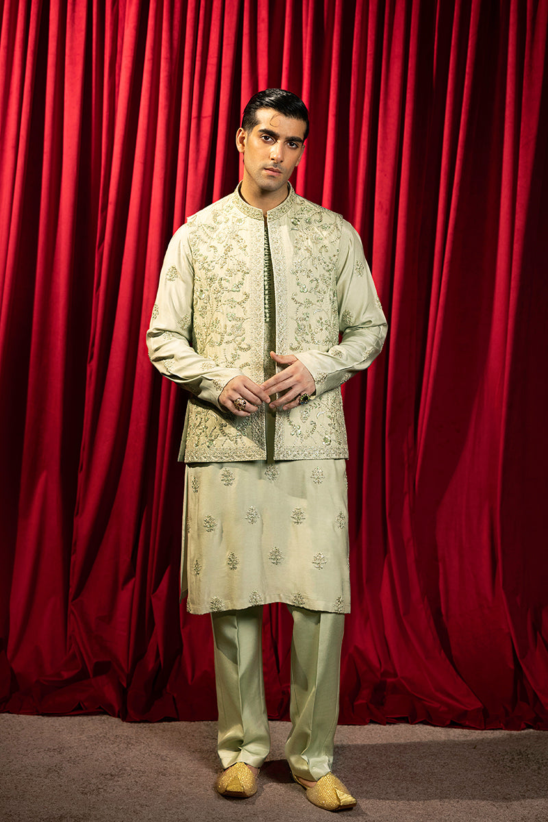 Designer pastel green kurta with waistcoat available online in Pakistan, featuring intricate embroidery and premium fabric, perfect for festive and formal occasions.